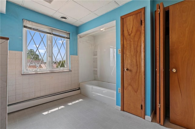 1518 Carlisle St, Natrona Hts/Harrison Twp, PA 15065 - full bath with baseboard heating, a tub, tile walls, a wainscoted wall, and tile patterned floors