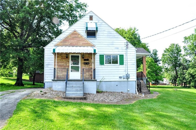 312 Delmont Ave, Coolbaugh Twp, PA 15012 - bungalow featuring a front lawn