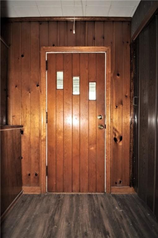 312 Delmont Ave, Coolbaugh Twp, PA 15012 - doorway featuring wood finished floors and wooden walls