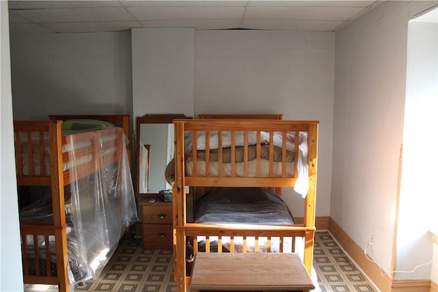 117 S Mckean St, City Of But Ne, PA 16001 - bedroom featuring tile patterned floors and a paneled ceiling