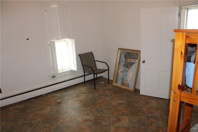 117 S Mckean St, City Of But Ne, PA 16001 - sitting room with baseboard heating and stone finish floors