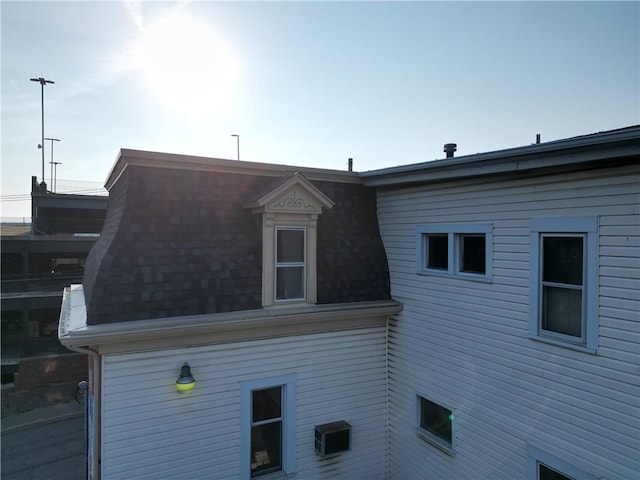 117 S Mckean St, City Of But Ne, PA 16001 - view of side of home with roof with shingles