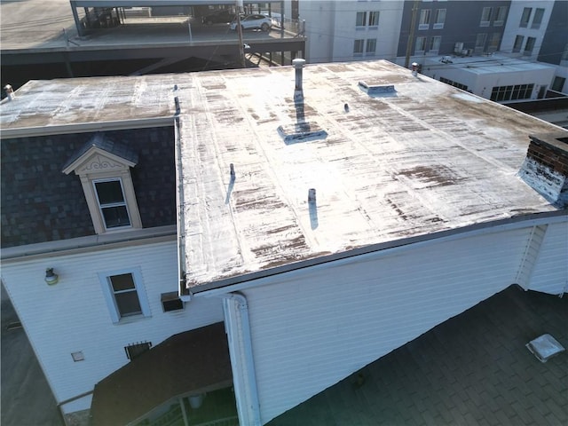 117 S Mckean St, City Of But Ne, PA 16001 - exterior view of a rolled roof