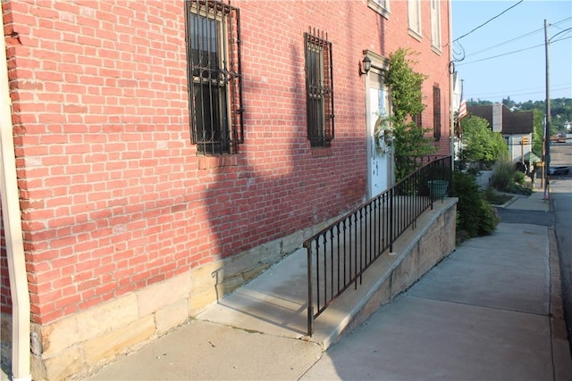 117 S Mckean St, City Of But Ne, PA 16001 - view of property exterior featuring brick siding
