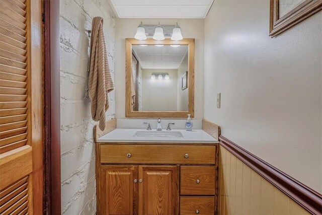 2509 Ridge Rd, Jefferson Hills, PA 15332 - bathroom with vanity and a wainscoted wall