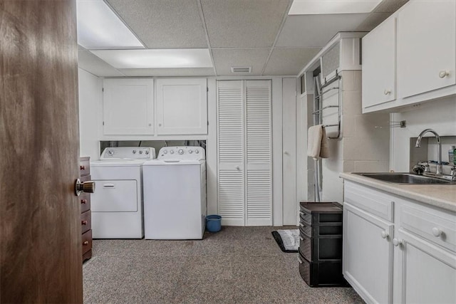 2509 Ridge Rd, Jefferson Hills, PA 15332 - laundry area featuring cabinet space, washer and dryer, and carpet flooring