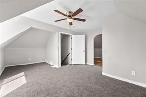 10207 Frankstown Rd, Penn Hills, PA 15235 - additional living space with lofted ceiling, arched walkways, carpet floors, and a ceiling fan
