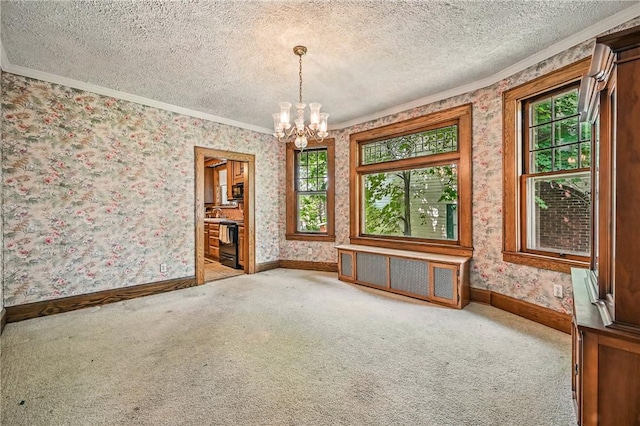 946 Alcoma St, Sharon, PA 16146 - unfurnished dining area featuring crown molding, healthy amount of natural light, carpet floors, a textured ceiling, and a chandelier