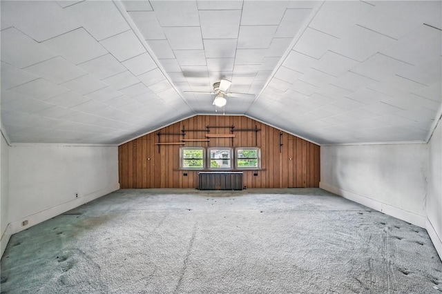 946 Alcoma St, Sharon, PA 16146 - additional living space with radiator heating unit, ceiling fan, vaulted ceiling, and light carpet