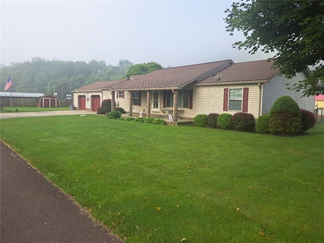 844 Williams St, Confluence Boro, PA 15424 - single story home featuring concrete driveway, an attached garage, and a front yard
