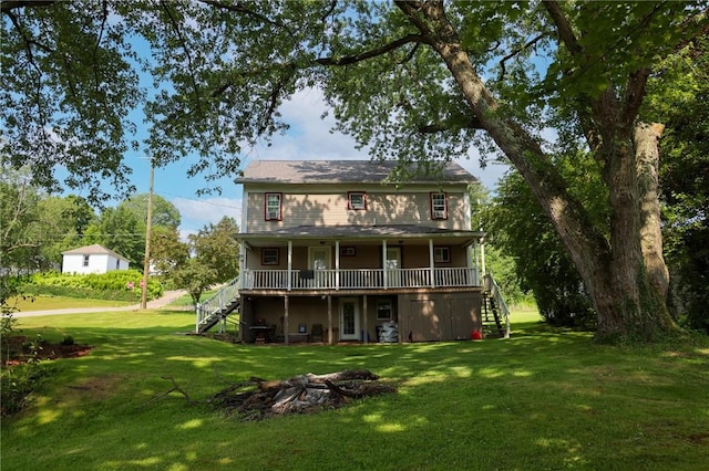 126 N Otter St, Mercer Boro Mer, PA 16137 - rear view of house with stairway, a lawn, and a deck