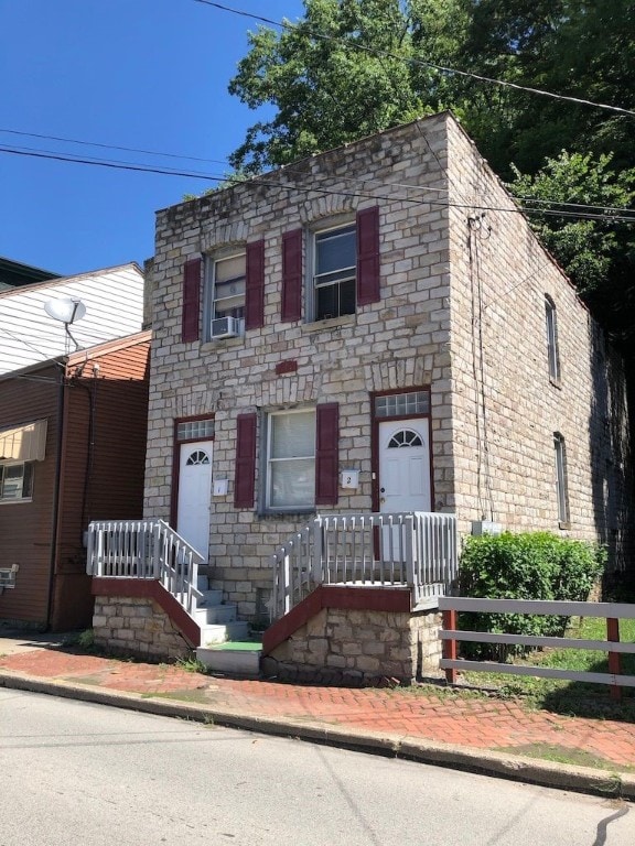 720 Evergreen Ave, Millvale, PA 15209 - view of front facade with stone siding and cooling unit
