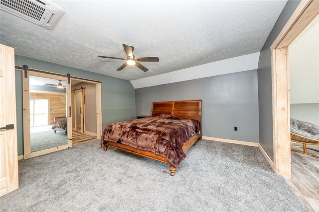1060 Wattersonville Rd, Coolbaugh Twp, PA 16218 - carpeted bedroom with ceiling fan and a textured ceiling