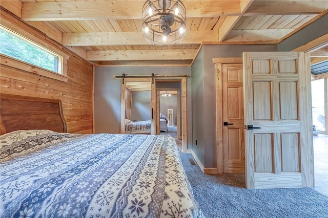 1060 Wattersonville Rd, Coolbaugh Twp, PA 16218 - carpeted bedroom with a wooden ceiling with exposed beams, wood walls, multiple windows, and a barn door