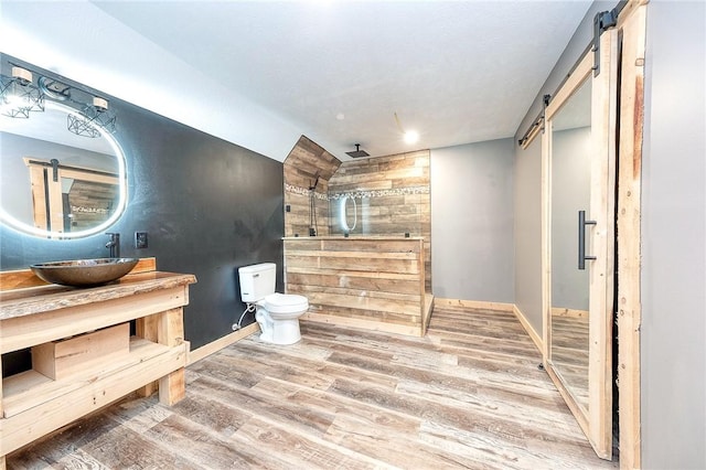 1060 Wattersonville Rd, Coolbaugh Twp, PA 16218 - full bath featuring tiled shower, wood finished floors, and vanity