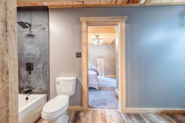 1060 Wattersonville Rd, Coolbaugh Twp, PA 16218 - full bath featuring wood finished floors and shower / washtub combination