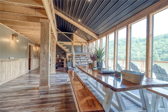 1060 Wattersonville Rd, Coolbaugh Twp, PA 16218 - sunroom with wood ceiling, wood finished floors, wainscoting, lofted ceiling, and wood walls