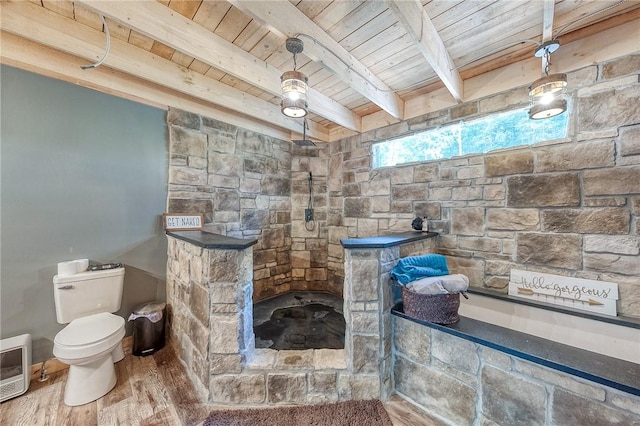 1060 Wattersonville Rd, Coolbaugh Twp, PA 16218 - bathroom with a wooden ceiling with exposed beams, wood finished floors, heating unit, a tile shower, and a bathtub