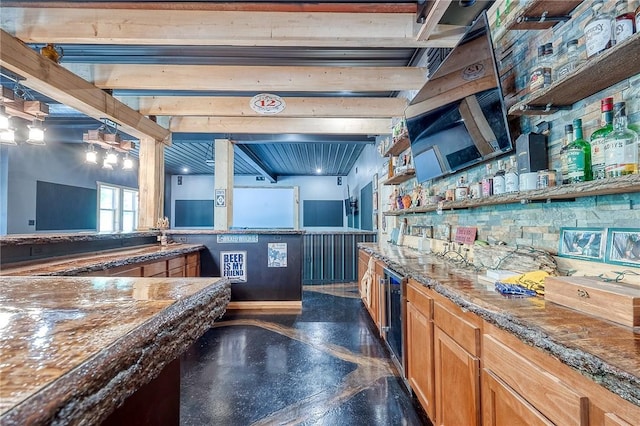 1060 Wattersonville Rd, Coolbaugh Twp, PA 16218 - indoor bar with beverage cooler, beam ceiling, and a wainscoted wall