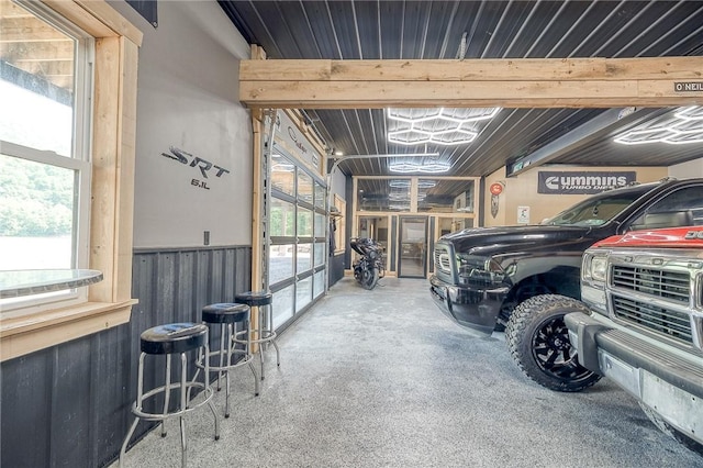 1060 Wattersonville Rd, Coolbaugh Twp, PA 16218 - garage featuring a wainscoted wall