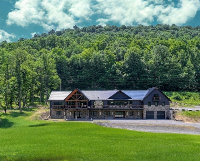 1060 Wattersonville Rd, Coolbaugh Twp, PA 16218 - view from above of property with a heavily wooded area