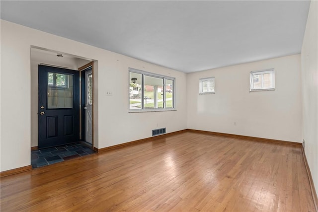 433 Wyndhurst Dr, Moon/Crescent Twp, PA 15108 - entrance foyer featuring healthy amount of natural light and wood finished floors