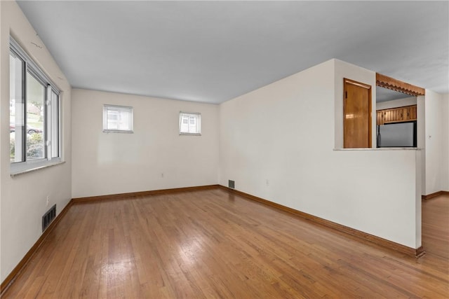 433 Wyndhurst Dr, Moon/Crescent Twp, PA 15108 - spare room featuring hardwood / wood-style flooring and baseboards