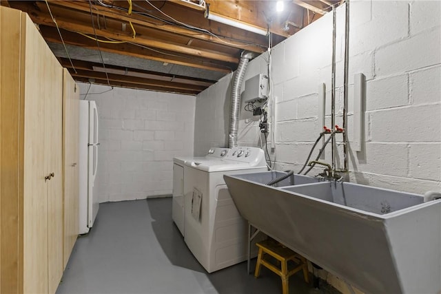 433 Wyndhurst Dr, Moon/Crescent Twp, PA 15108 - laundry area with washer and clothes dryer and concrete block wall