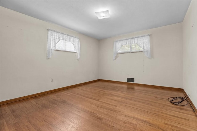 433 Wyndhurst Dr, Moon/Crescent Twp, PA 15108 - spare room featuring wood finished floors and baseboards