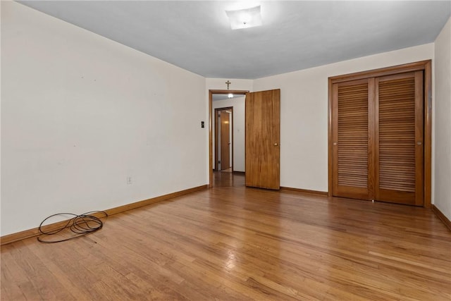 433 Wyndhurst Dr, Moon/Crescent Twp, PA 15108 - unfurnished bedroom with light wood finished floors and a closet