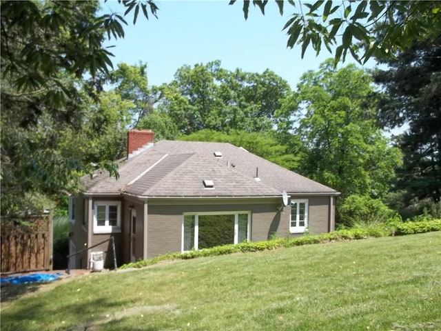 243 Byron Rd, Ross Twp, PA 15237 - rear view of property with a chimney