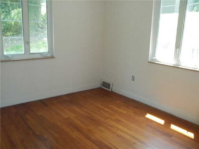 243 Byron Rd, Ross Twp, PA 15237 - spare room with healthy amount of natural light and wood finished floors
