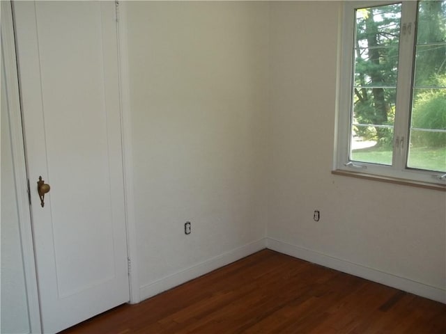 243 Byron Rd, Ross Twp, PA 15237 - unfurnished bedroom featuring dark wood-style floors and multiple windows