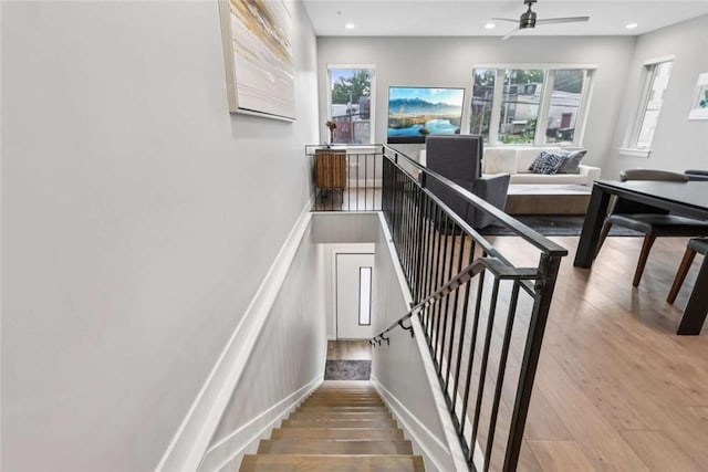 316 47th St, Lawrenceville, PA 15201 - stairs featuring recessed lighting, wood finished floors, and a ceiling fan