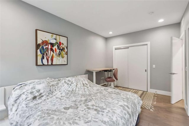 316 47th St, Lawrenceville, PA 15201 - bedroom featuring wood finished floors, recessed lighting, and a closet