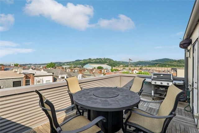 316 47th St, Lawrenceville, PA 15201 - balcony featuring a mountain view, outdoor dining area, and a grill