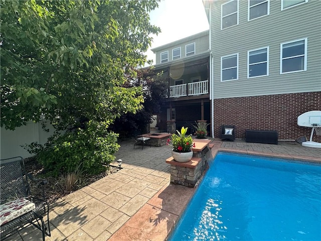 30 Trotter Ln, Findlay Twp, PA 15026 - swimming pool with a patio and a fire pit
