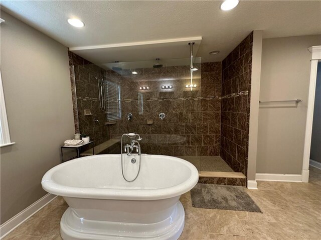 30 Trotter Ln, Findlay Twp, PA 15026 - bathroom with a freestanding bath, tiled shower, and recessed lighting