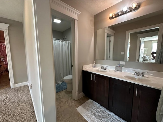30 Trotter Ln, Findlay Twp, PA 15026 - full bathroom featuring double vanity and a textured ceiling