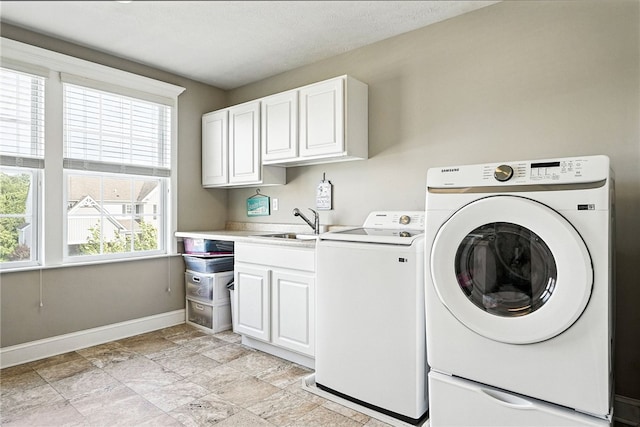 30 Trotter Ln, Findlay Twp, PA 15026 - washroom featuring cabinet space, independent washer and dryer, and light stone finish flooring