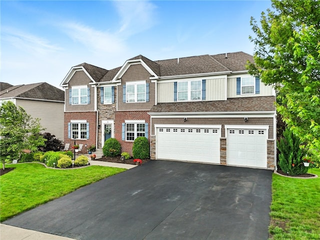 30 Trotter Ln, Findlay Twp, PA 15026 - view of front of home featuring a garage, driveway, stone siding, and a front yard