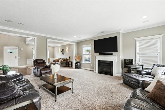 30 Trotter Ln, Findlay Twp, PA 15026 - carpeted living area featuring ornamental molding, a glass covered fireplace, and recessed lighting
