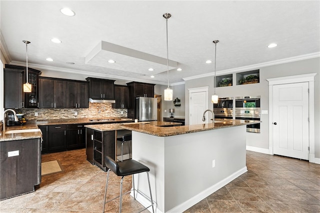 30 Trotter Ln, Findlay Twp, PA 15026 - kitchen featuring ornamental molding, appliances with stainless steel finishes, a spacious island, decorative backsplash, and recessed lighting