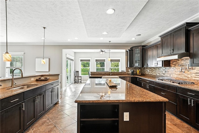 30 Trotter Ln, Findlay Twp, PA 15026 - kitchen featuring stainless steel gas stovetop, healthy amount of natural light, decorative backsplash, a textured ceiling, and recessed lighting
