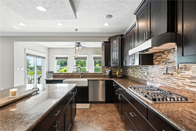 30 Trotter Ln, Findlay Twp, PA 15026 - kitchen featuring appliances with stainless steel finishes, a ceiling fan, dark stone countertops, tasteful backsplash, and ornamental molding
