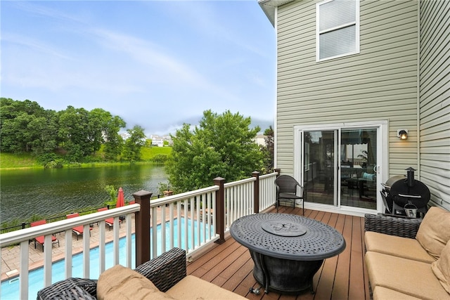 30 Trotter Ln, Findlay Twp, PA 15026 - wooden deck with a water view, an outdoor pool, and area for grilling