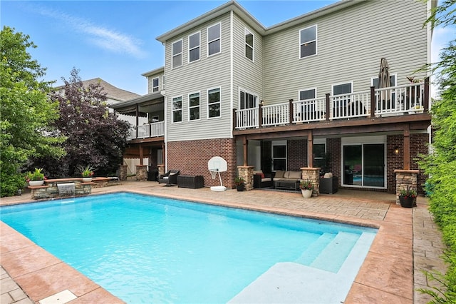 30 Trotter Ln, Findlay Twp, PA 15026 - rear view of house with a patio, a balcony, an outdoor hangout area, an outdoor pool, and brick siding