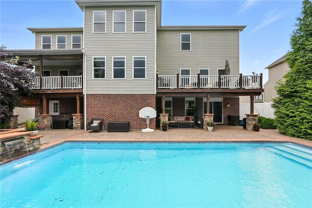 30 Trotter Ln, Findlay Twp, PA 15026 - back of property featuring a patio, outdoor lounge area, brick siding, and a balcony