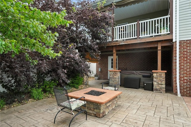 30 Trotter Ln, Findlay Twp, PA 15026 - view of patio featuring a hot tub and an outdoor fire pit