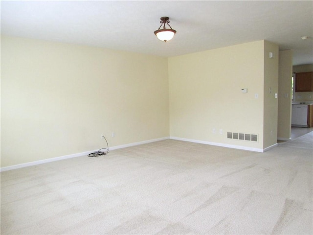 6921 Spring Valley Ln, Murrysville, PA 15632 - empty room featuring light carpet and baseboards